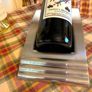 Lenox wine bottle holder in new condition.